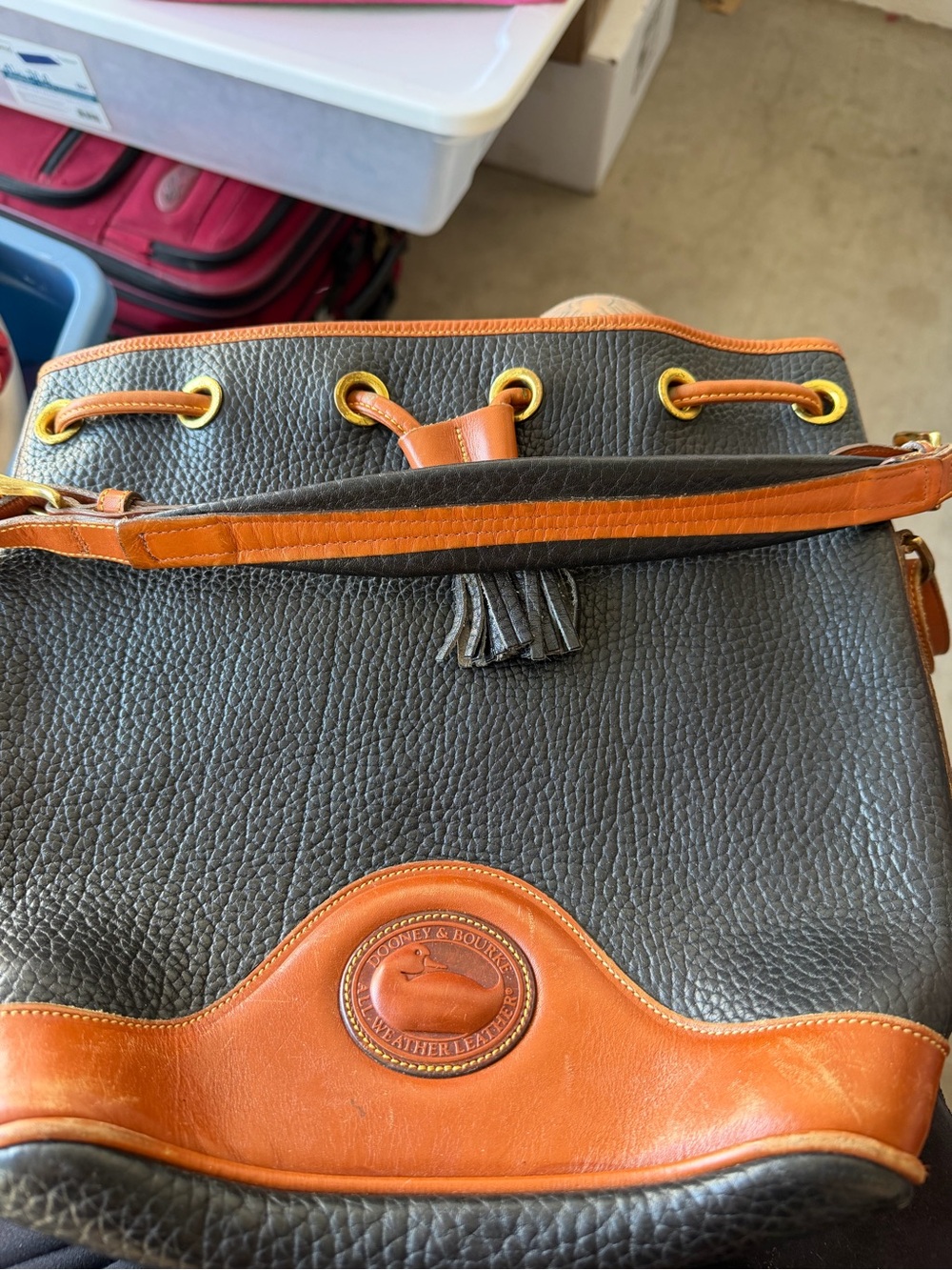 Dooney & Bourke Black and Tan Pebble Leather Drawstring Shoulder Bag